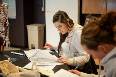 QCC students study in health classroom