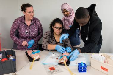 Students practice medical techniques